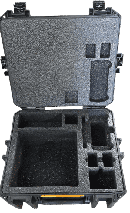 Open black case with fitted foam, lid openings and a yellow handle.