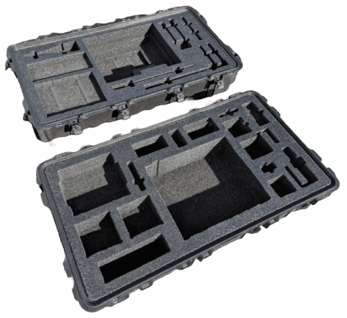 Open case with a foam insert containing multiple shaped equipment pockets.