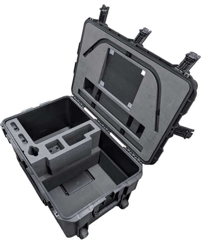 Angled view of an open black transport case with fitted gray foam in its base and lid.