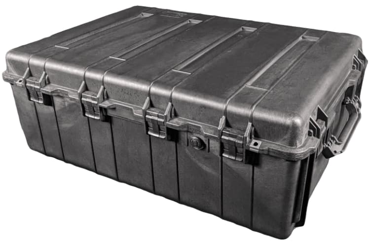 Closed large black hard case with ribs, latches and side handles