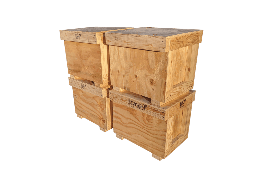 Four closed wood shipping crates stacked in two pairs