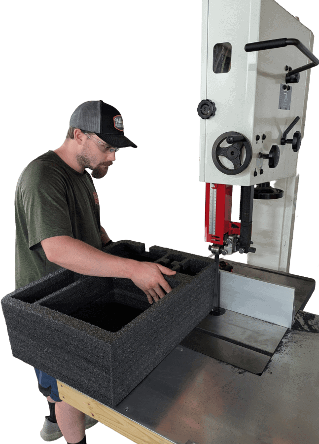 A Vol Case team member fabricating a foam insert
