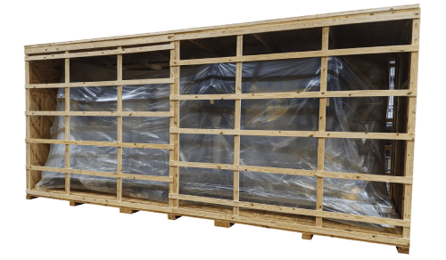 Long wood slat crate with wrapped equipment visible between the slats