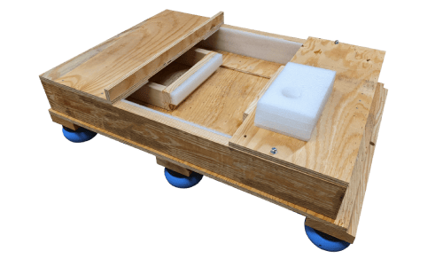 Wood shipping base with white foam supports and blue feet