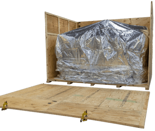 Oversized crate with barrier bagging and one side removed