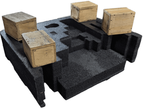 Weight blocks holding foam layers together while glue hardens